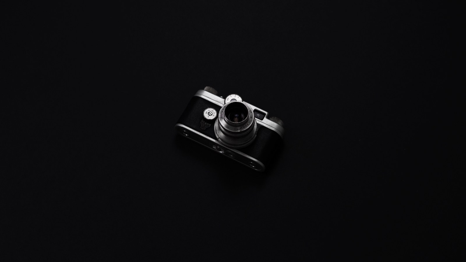A close-up of a camera prepared for use.